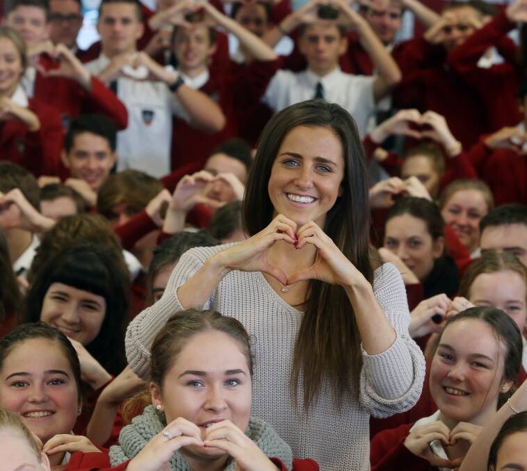 Show of support: Kate Fitzsimons with Corpus Christi Catholic High students. Picture: Robert Peet