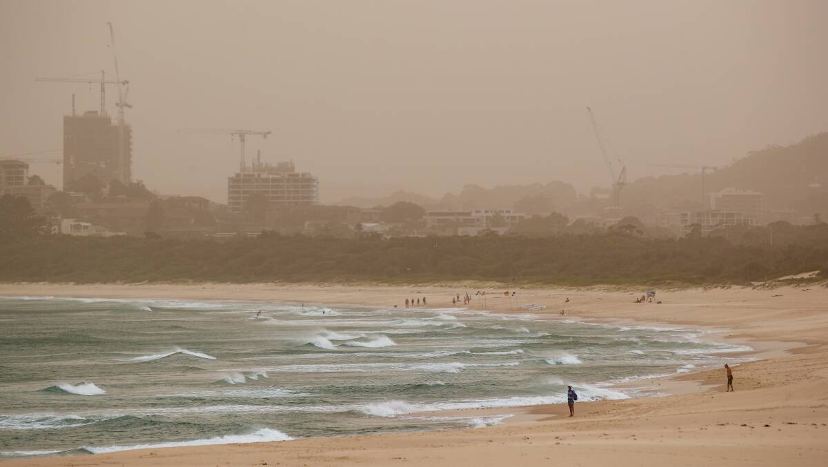 Smoke and dust have reduced air quality across the region over the past month. This photo was taken at Fairy Meadow beach on November 12. Picture: Adam McLean