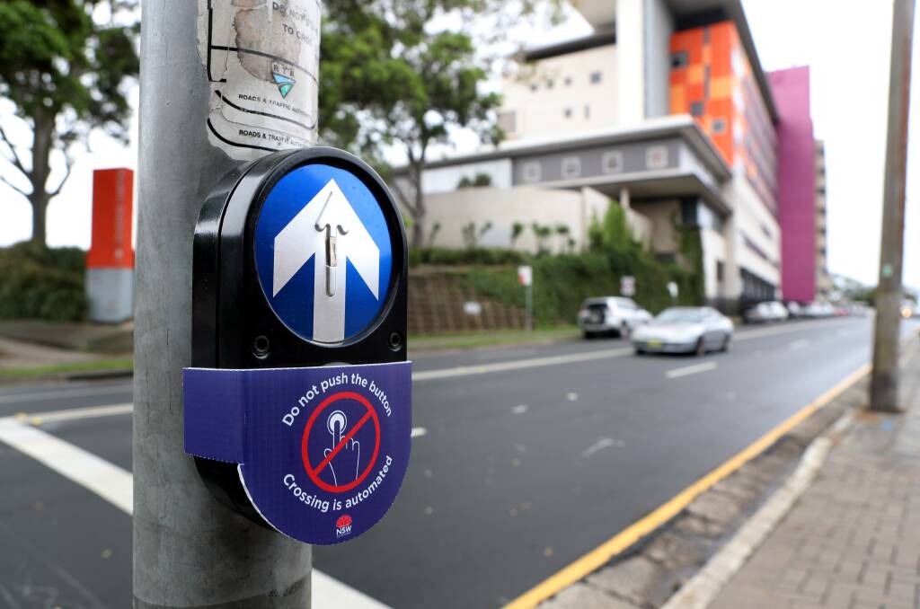 Safety first: Automated pedestrian crossings are now active in the Wollongong Hospital precinct to stop the spread of COVID-19. Picture: Robert Peet