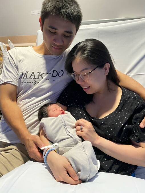 Thuy Huynh and Bao Dang with baby Adelynn, the first baby born at Wollongong Hospital on New Year's Day. Picture: Supplied