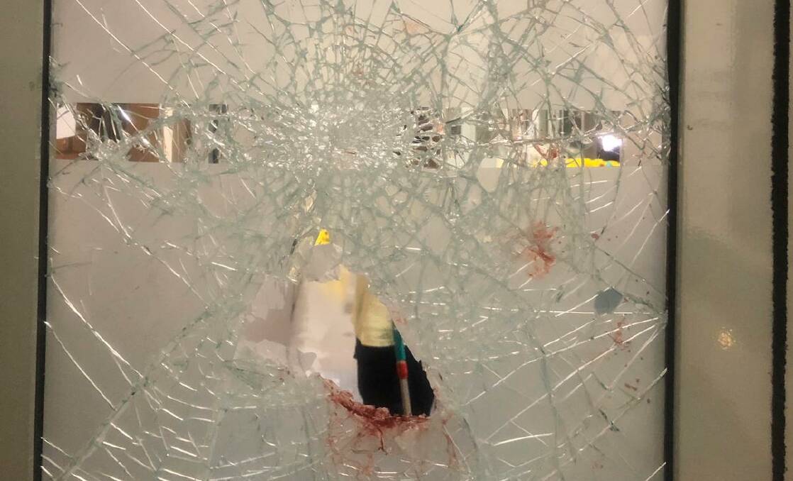 Damage control: Photos sent to the Mercury by a Shellharbour Hospital mental health unit staff member, of a glass door which had been smashed by a patient.