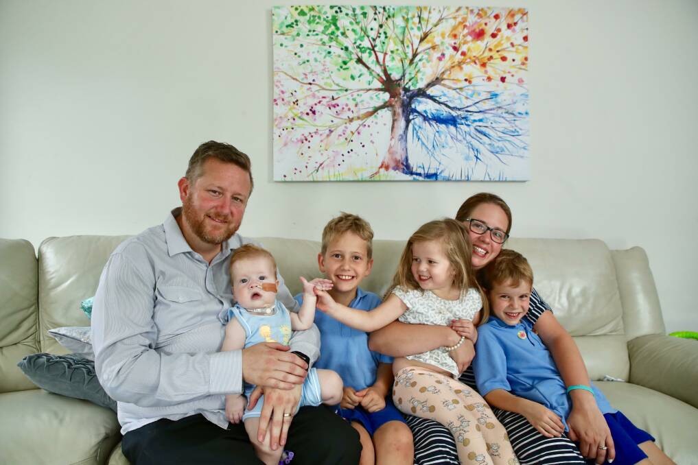 Jenny and Peter Northey - with little Eli and his siblings Liam, 6; Ava, 3 and Luke, 8 - are grateful for the support from the Illawarra Community Foundation. Picture: Adam McLean
