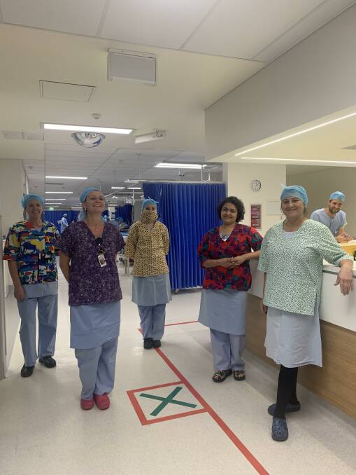 Wollongong Hospital staff Diann Leplaw, Margo Kelberg, Sarika Rathi and Yasemin Riza in their colourful scrubs. Picture: Supplied