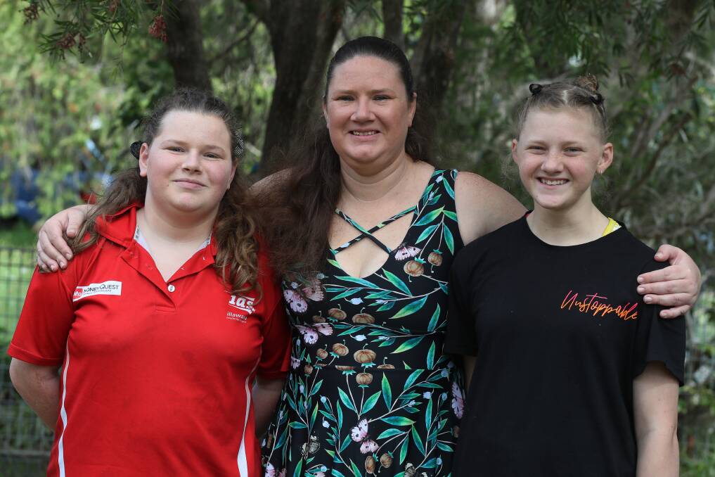 Dapto mum Amy Williamson, with daughters Chloe and Lizzie, has welcomed a new report which aims to reduce the myths and misconceptions surrounding ADHD. Picture: Robert Peet