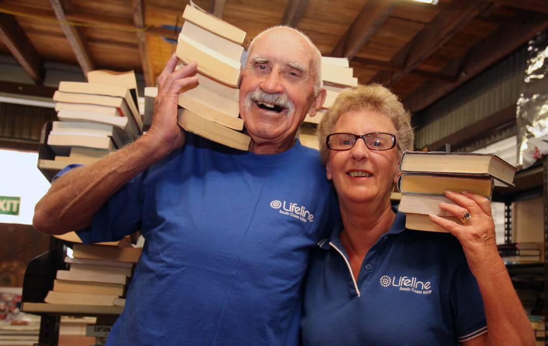 Fair effort: Lifeline volunteers Neville Jolly and Liz Carter have been part of the book fair since its inception and are looking forward to the 21st event this weekend. The fair runs twice a year, in March and October. Picture: Greg Totman