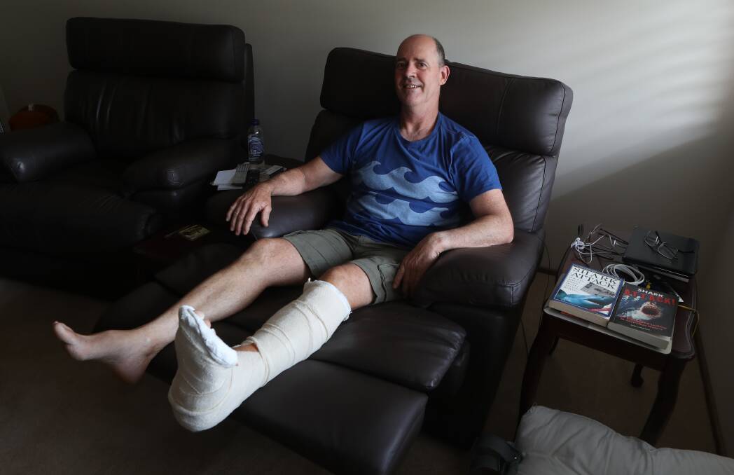 Sudden attack: Albion Park surfer Wil Schroeter is recovering after he was bitten to the bone on his left foot by a shark while surfing at Windang beach. Picture: Rob Peet 