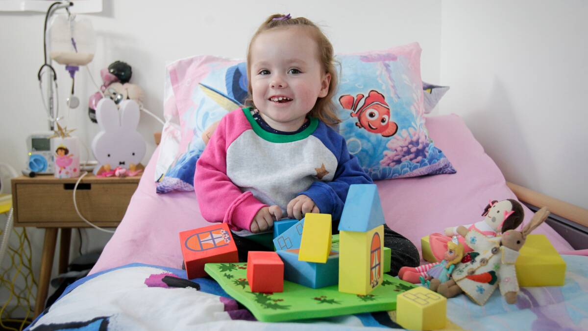Tower of strength: The treatment has given Ruby a stronger grasp, allowing her to play with her toys better, and has helped her sit independently for the first time. Picture: Adam McLean
