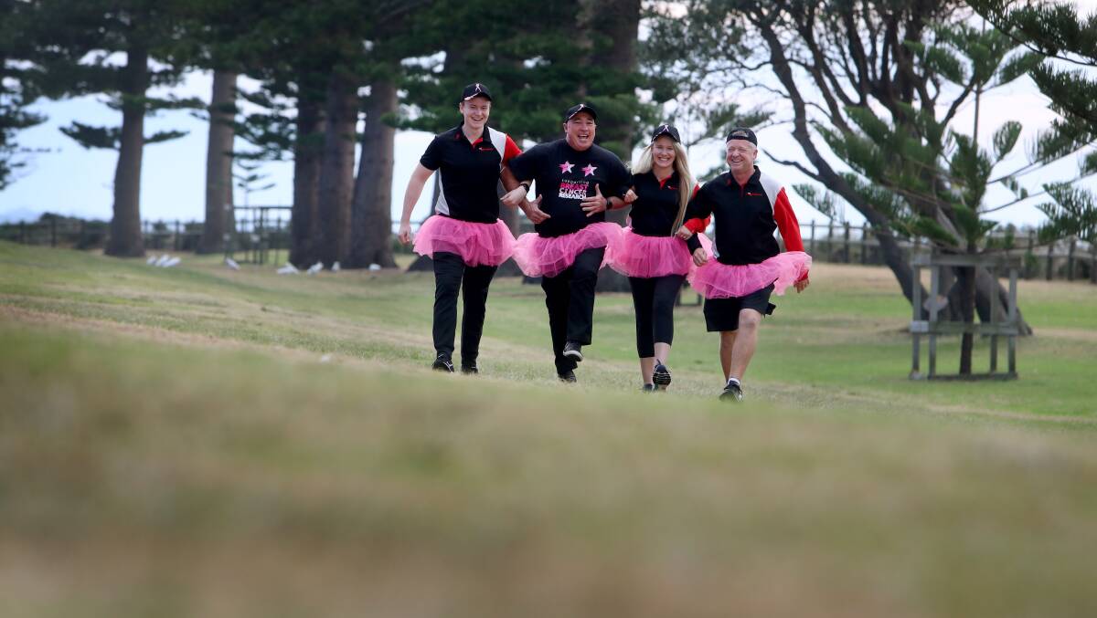 Event manager Grant Plecas (second from left) and long-time supporters Cameron, Rachel and Brett Magennis of Athletes Foot Wollongong get ready for Wollongong's Mother's Day Classic fun run. Picture: Sylvia Liber