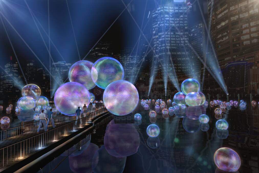 Visitors to Vivid Sydney can walk underneath bubble spheres on a new light and sound installation, Ephemeral. 