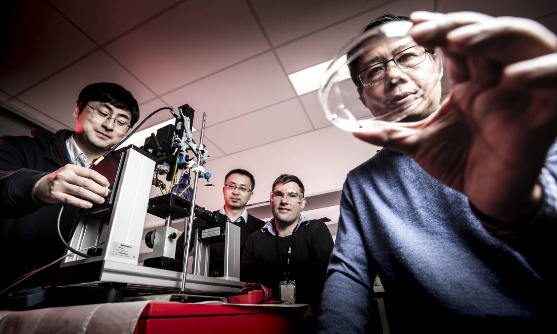 Breakthrough: UOW Professor Xiaolin Wang (front) and team members including PhD students Frank Fei Yun and Zhenwei Yu as well as Dr David Cortie have created a metal liquid heartbeat. Picture: Paul Jones