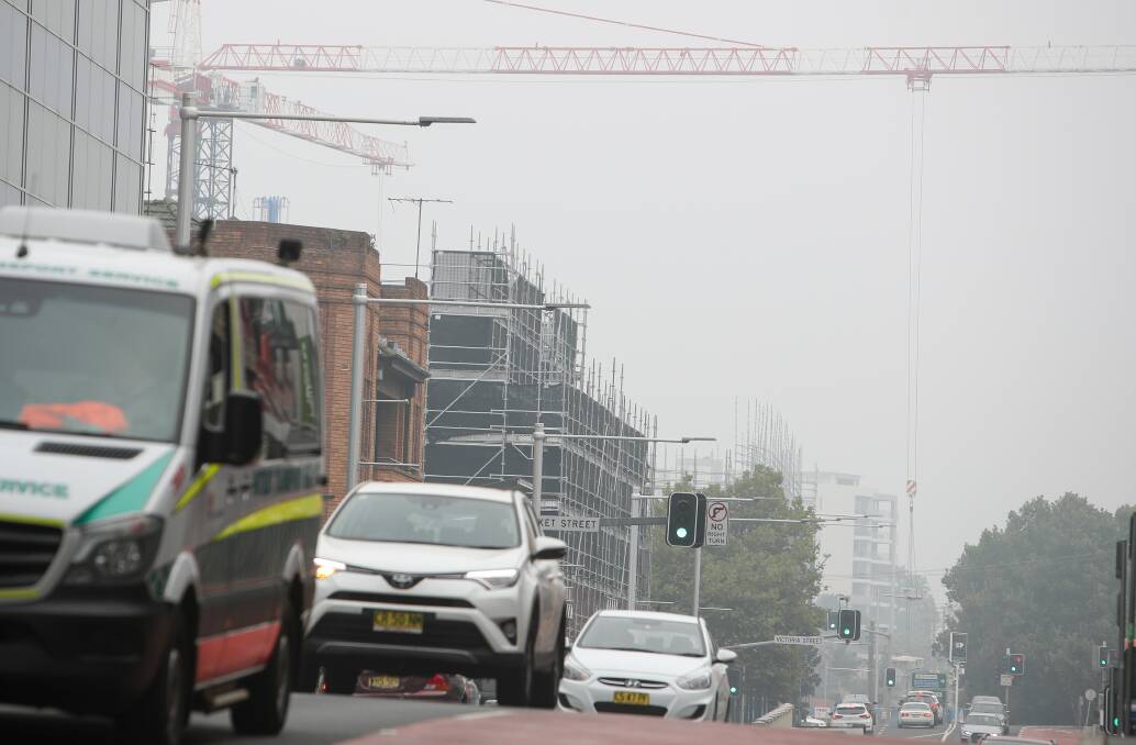 Smoky skies contributed to a surge in presentations to hospital emergency departments across the region in January. In this photo from January 8, smoke hung heavily over the Wollongong CBD. Picture: Adam McLean