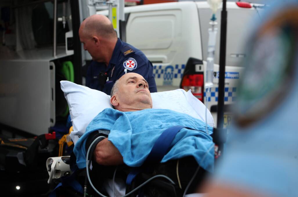 Emergency response: Paramedics were quickly on scene, treating Mr Schroeter and transporting him to Wollongong Hospital where he underwent two surgeries. Picture: Sylvia Liber