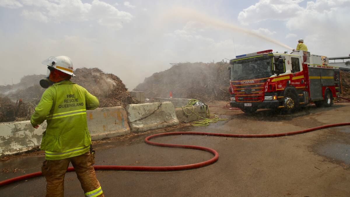 Firefighters work to put out the mulch fire at Moss Vale tip. Picture: Adam McLean