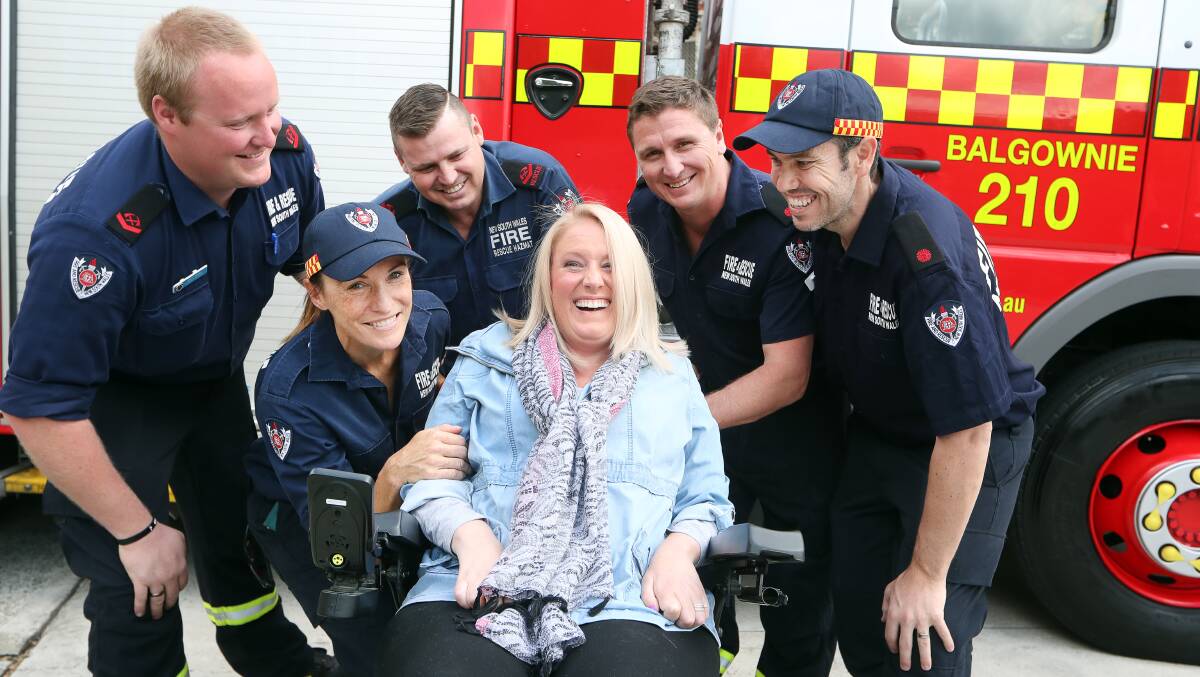 Show of support: Balgownie firies Jason Pack, Belinda Down, Brett Swan, Travis Down and Luke Rowles with Sharn McNeill. Picture: Sylvia Liber