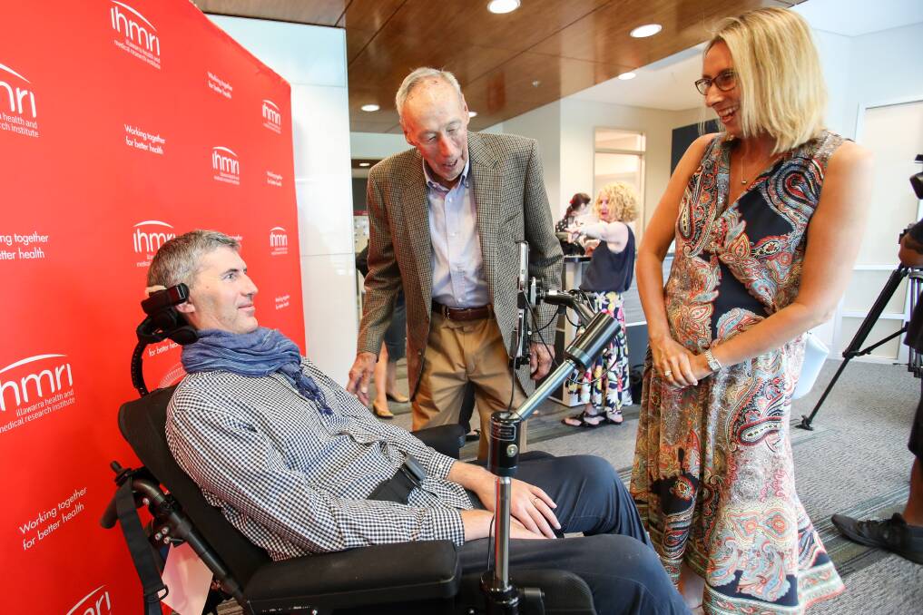 Invaluable support: Philanthropist John Laidlaw and his daughter Melissa Duggan meet with Professor Justin Yerbury who continues to work to find a cure for MND despite his own battle with the disease. Picture: Adam McLean