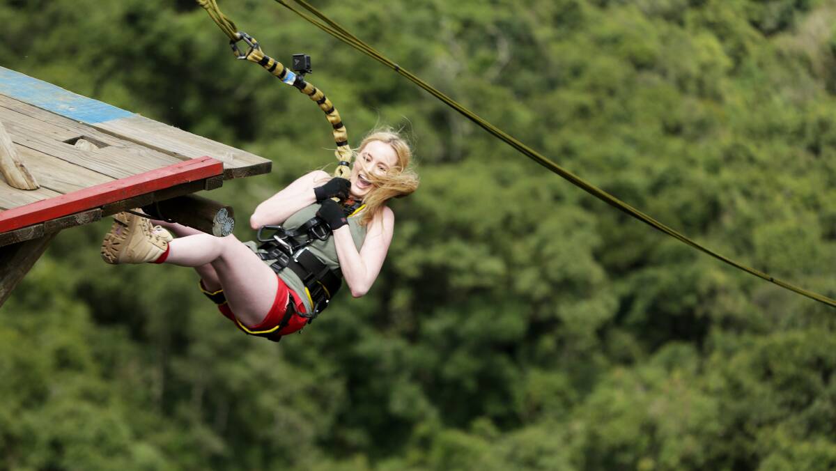 Flying high: Corrimal's Simone Holtznagel swinging her way into adventure as a contestant on I'm A Celebrity Get Me Out of Here. Picture: Supplied