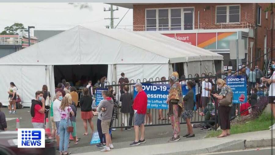 Queues of people wait to be tested at Wollongong Hospital late on Tuesday. Picture: Channel 9