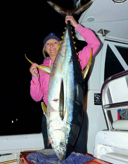 Battle won: Vanki Feher with her 35 kilo yellowfin tuna from offshore Shellharbour. (Photos submitted for publication should be high res - around 1MB is ideal)