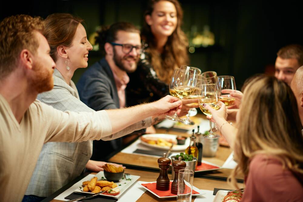 Worth a toast: Dining and entertainment vouchers announced in this week's state budget will see $500 million injected into these sectors early next year. Picture: Shutterstock