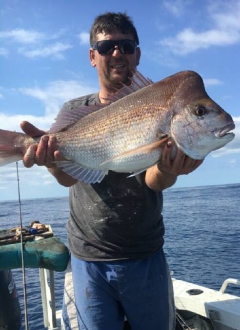 Bahri Ozman with a fine Shellharbour reef snapper he caught recently.