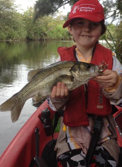 Well caught: Ryder Evans with a nice local bass just before release.