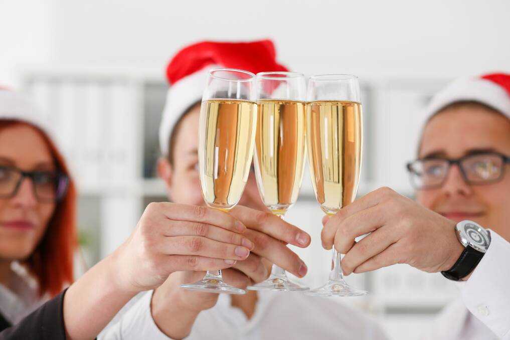 Christmas danger: There is always plenty of alcohol about at office Christmas parties. Make sure you hydrate well to avoid that next-day hangover.
