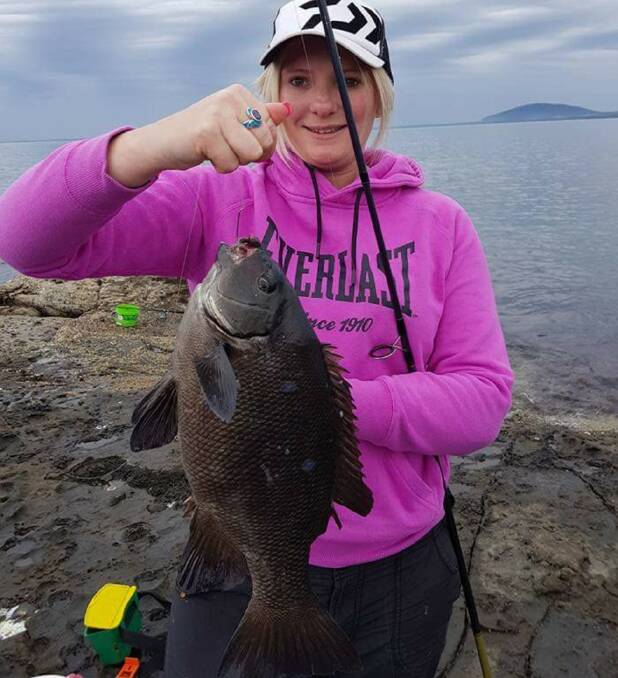Black beauty: Ivanka Matic fished the stones to nail this solid rock blackfish. (photos submitted for publication should be high res - at least 1MB)