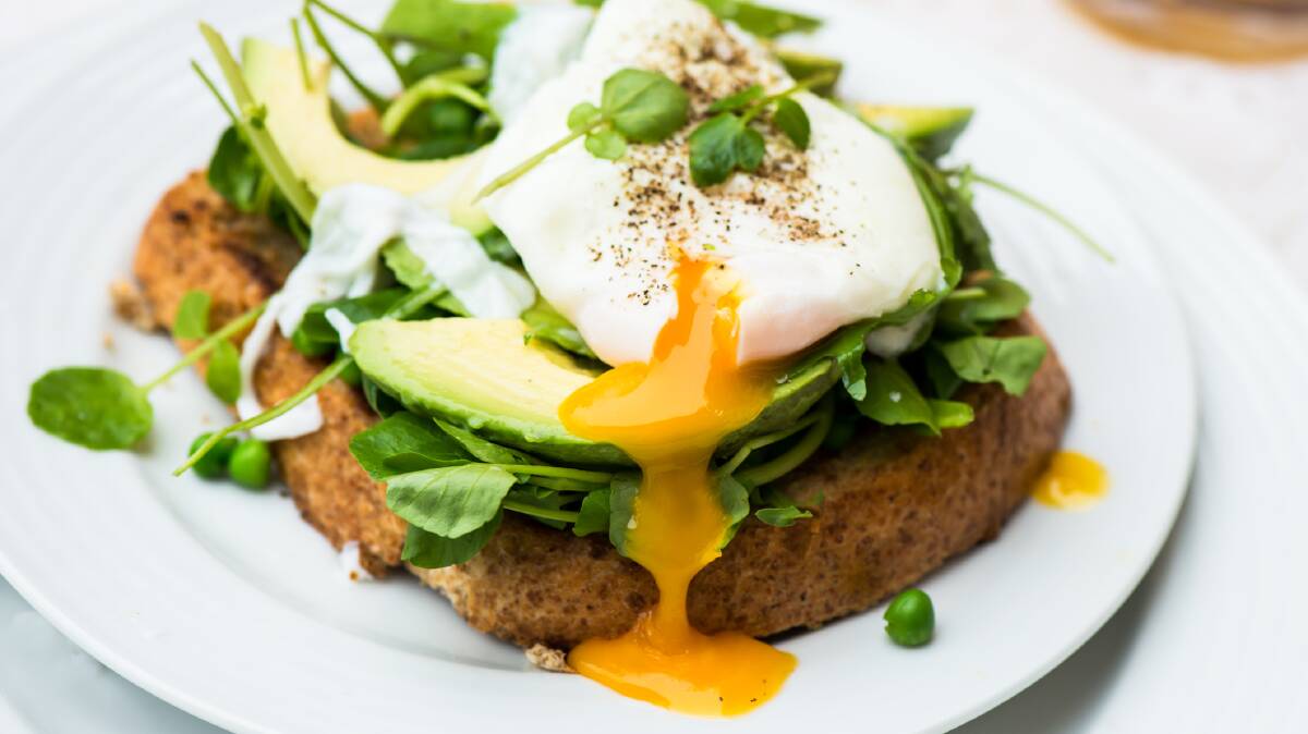 Perfect start: Poached eggs with avocado and spinach is a great protein-packed way to start you day, according to fitness expert Lukas Chodat.