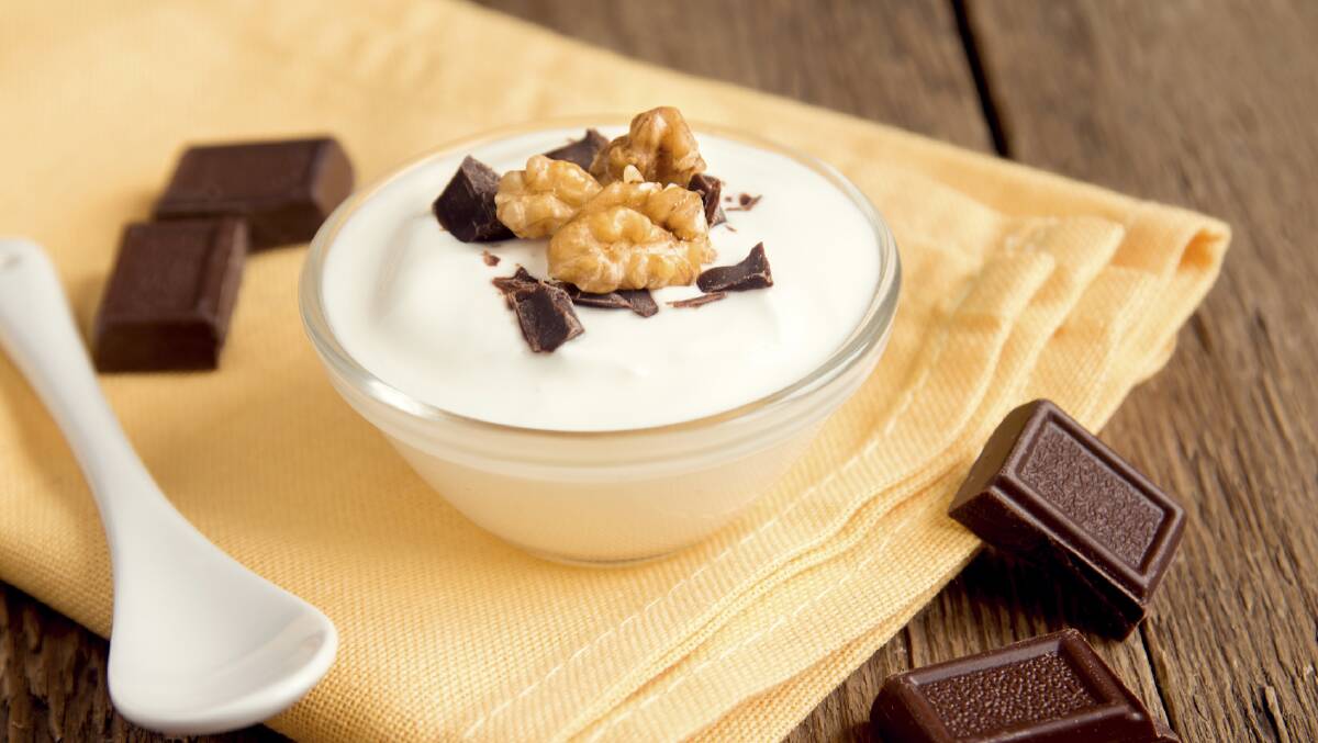 Healthy eating: Plain yoghurt with nuts or dark chocolate is a sensible choice for a late supper. 