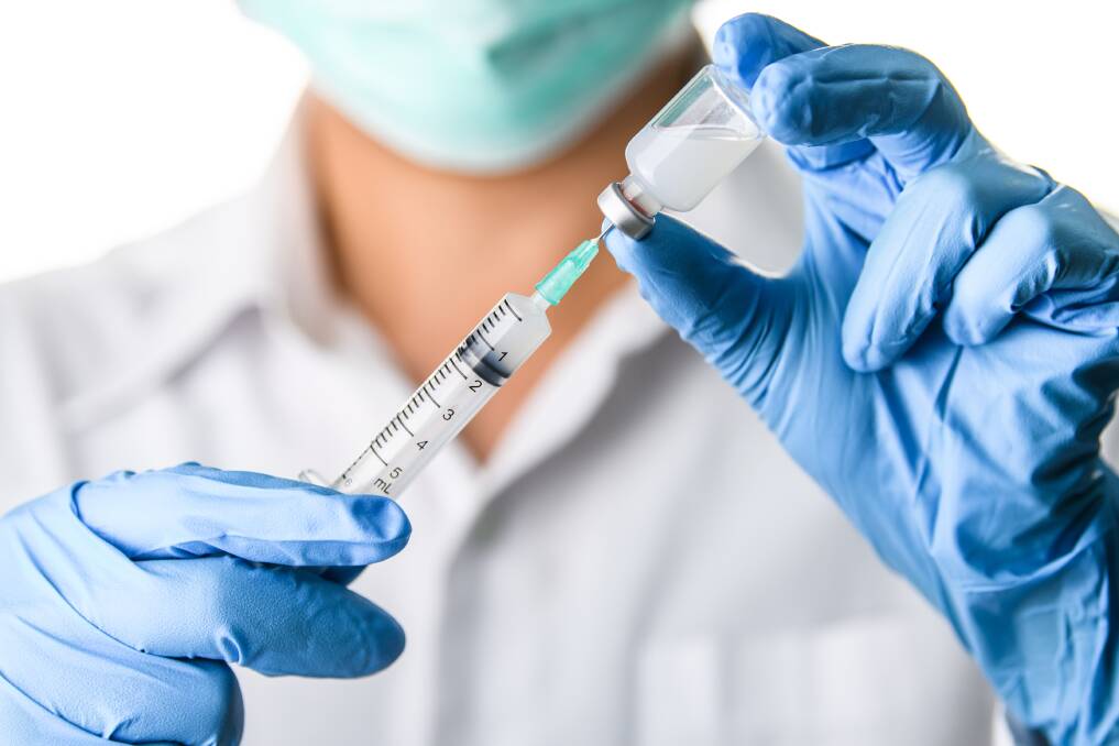 Fingers crossed: The budget projections are based on the assumption that a vaccine for coronavirus will be ready and distributed throughout Australia by the end of next year. Photo: Shutterstock