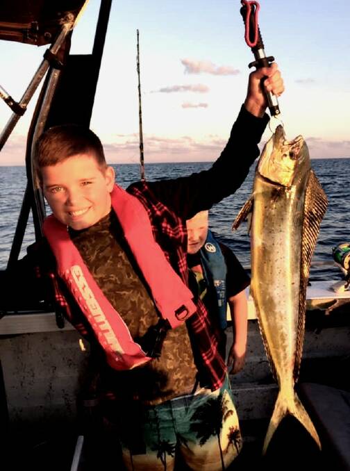 Thomas Glover with his first ever dolphin fish.
