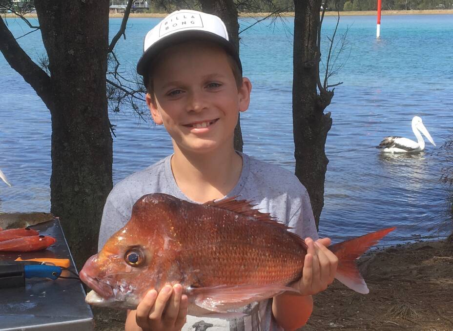 Top catch!: Jye Spinks with an excellent snapper from a recent trip to Burrill Lake near Ulladulla. (Photos submitted for publication should be high res- 1MB)