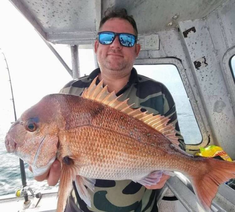 Big Red: Jeremy Menchin with a solid snapper from last weekend.