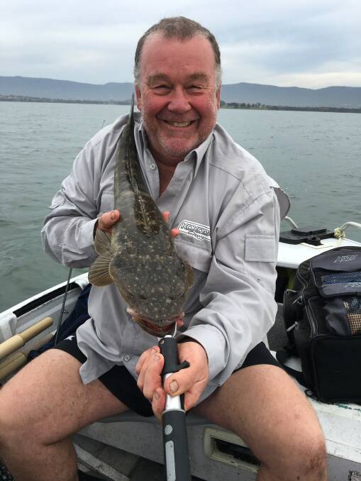 Nice catch: Mark Pryor is excited with his plastics-caught 69cm Lake flatty.
