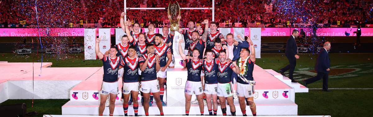 Sydney Roosters players celebrate their 2019 NRL Grand Final win over Canberra. With two first-up losses and a tough draw ahead, the Roosters will be up against it in their hunt for a premiership three-peat in 2020. Photo: Jason McCawley/Getty Images