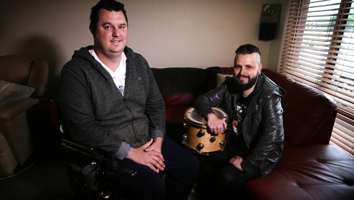 Rock 4 Regal is a fundraising concert for MND research, named in honour of Illawarra man Adam Regal, pictured here with  musician Den Murray. Picture: Sylvia Liber. 
