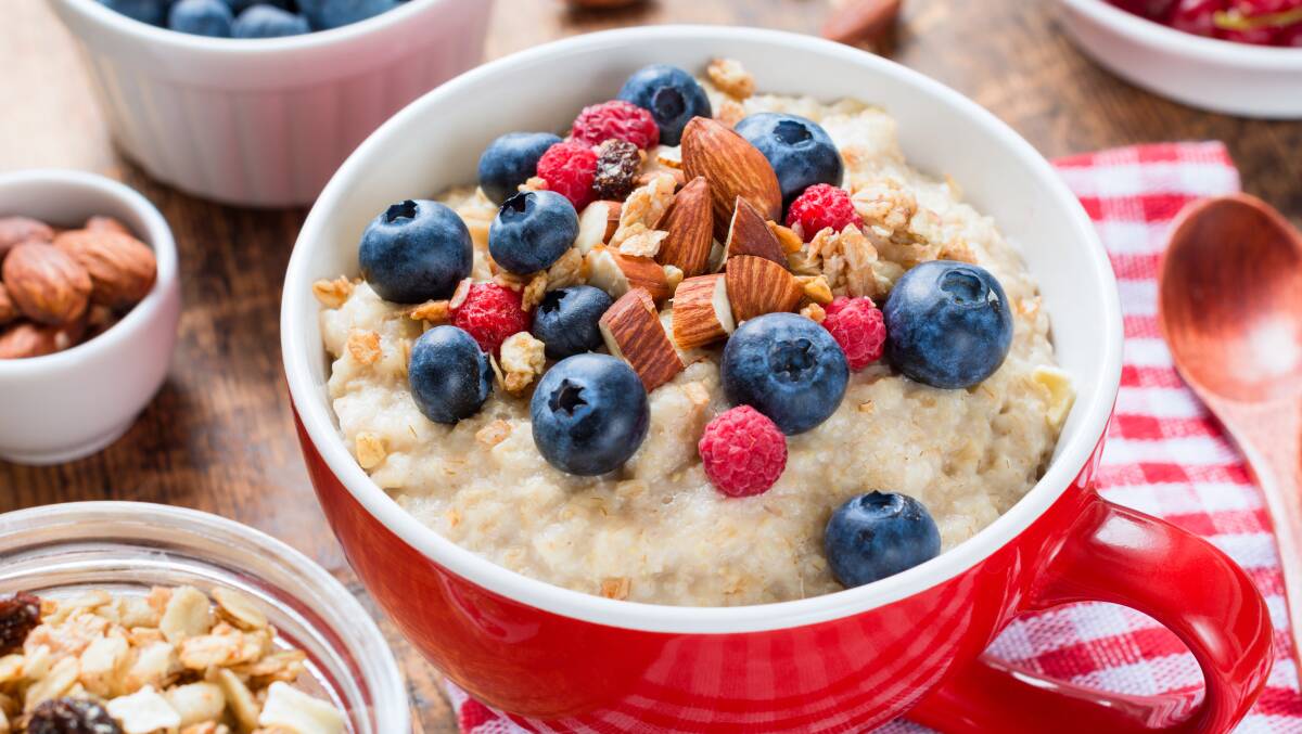 Healthy breakfast: Oatmeal porridge with nuts, blueberries and raspberries is a great way to start your day.