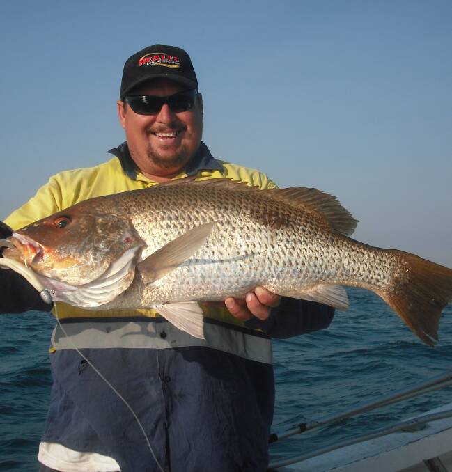 Dinner time: Troy Sharpe with an excellent eating fingermark. Send your high res fishing photos to gazwade@bigpond.com.