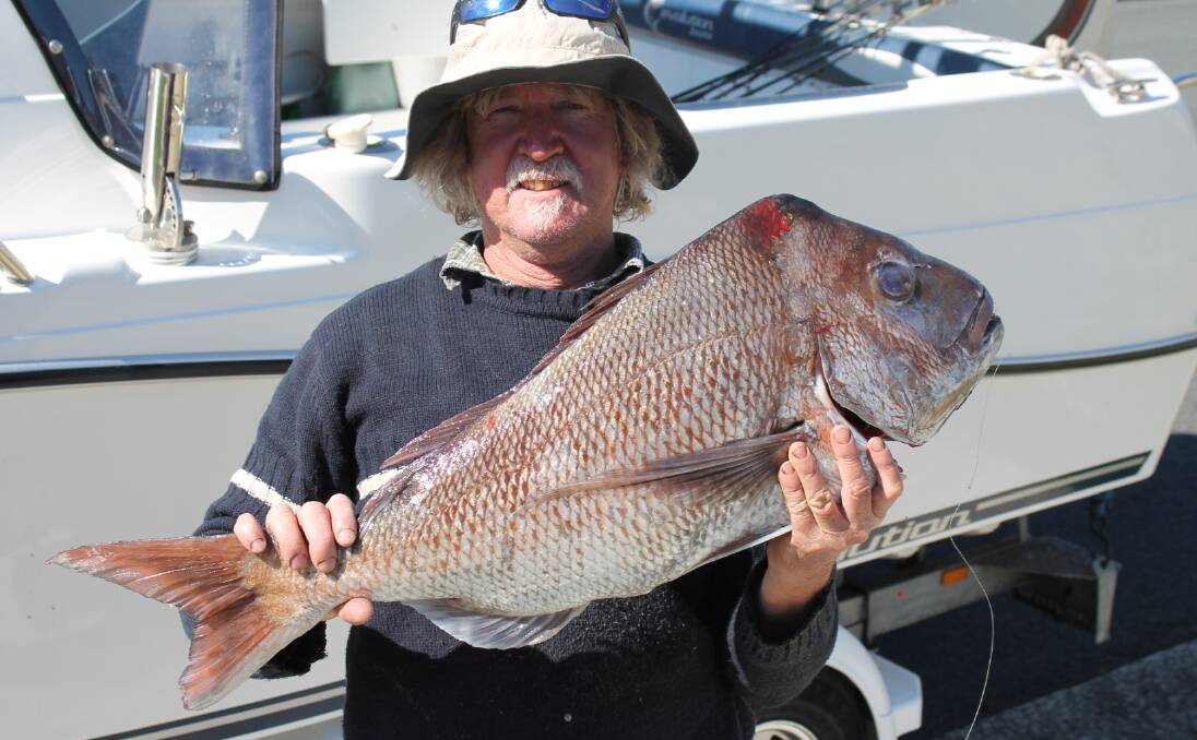 Big red: Henry Weddeman with a 7kg snapper caught off Bellambi just last Wednesday. Reds have come on the bite in a big way this last week.