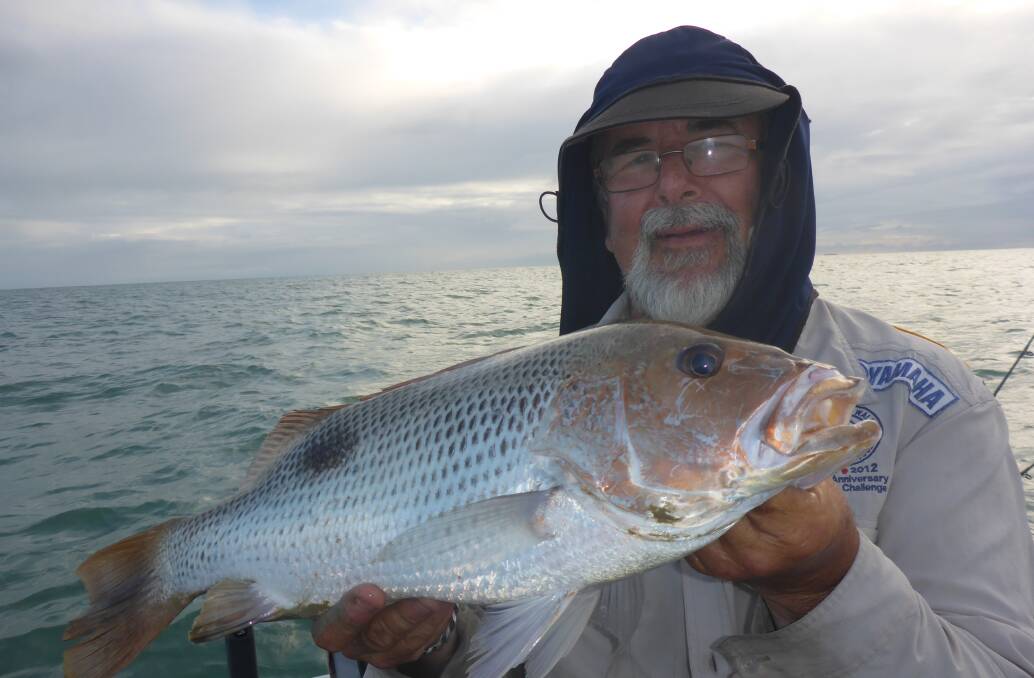 Dinner time: Peter Tornaros from Oak Flats with a delicious eating fingermark from a recent trip to King Ash Bay.