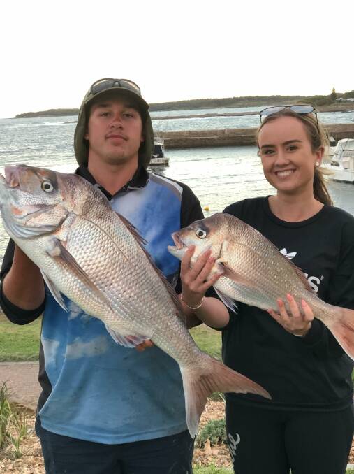 Joseph da Silva and Emily Prisk with a pair of nice local snapper.