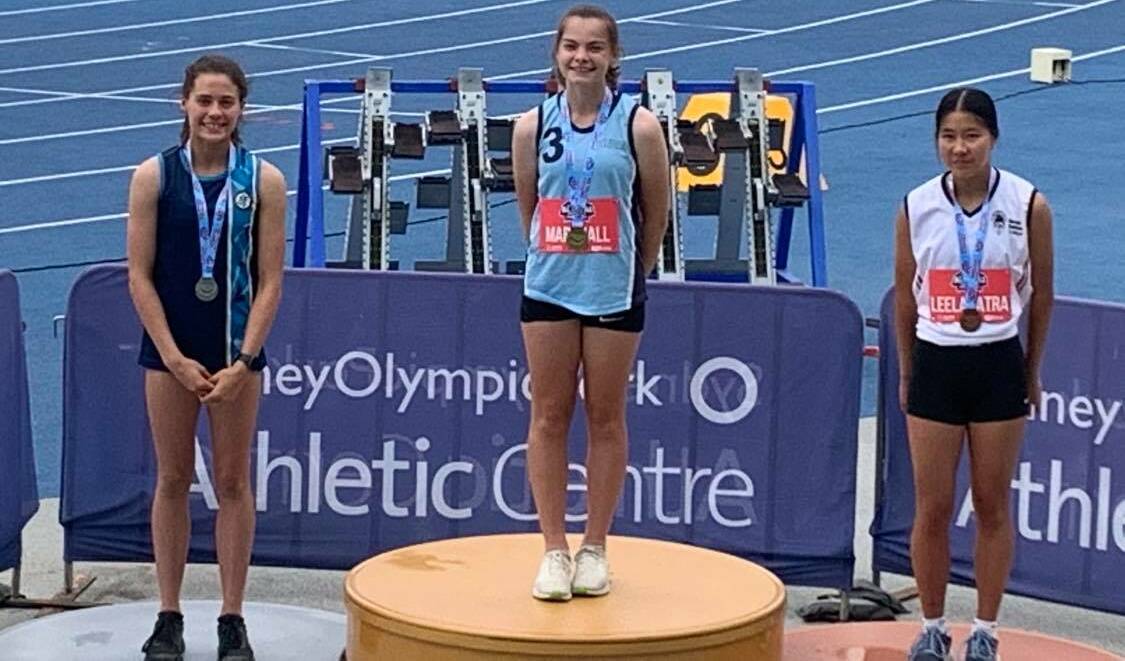 Naomi Gibson (left) wins silver in the pole vault at the NSW All Schools at SOPAC in 2020. Picture: Danielle Szakacs