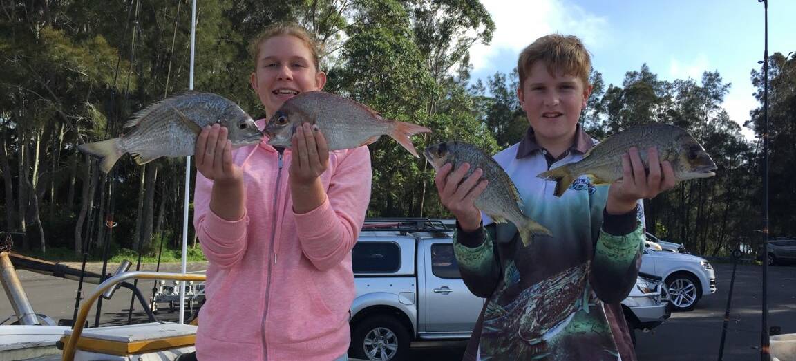 Big day out: Kristy Bonner and Davis Walton with a haul of bream and snapper from St Georges Basin. (Photos submitted for publication should be high res)