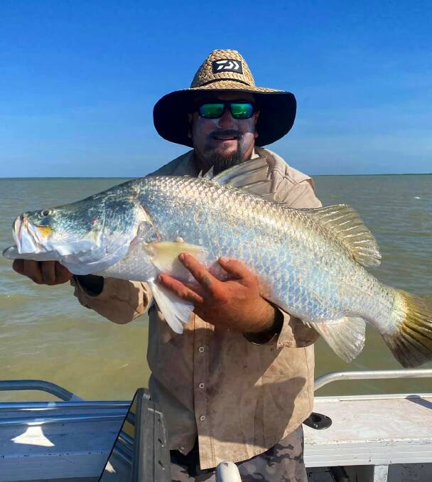 Happy returns: Tim Tornaros fished for barramundi on his birthday and nailed this impressive horse.