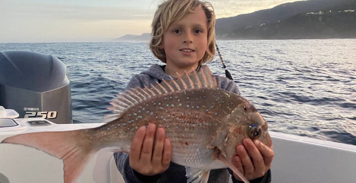 Reds on the chew: Ashton Mekisic with a nice school-sized red from up off Bulli area. Email your high res fishing photos to gazwade@bigpond.com