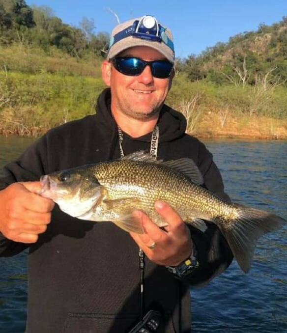 Bass player: Nic Brunyee with a solid Australia bass just before release.
