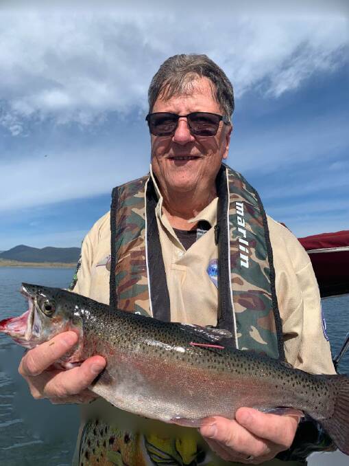 Canberras Neville Betts shows he is no slouch at catching rainbow trout.