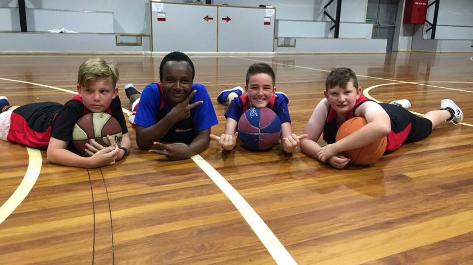 Fun and games: Some of the youngsters who had a ball at the last Twilight Tournament basketball event supported and funded by Rotary. 