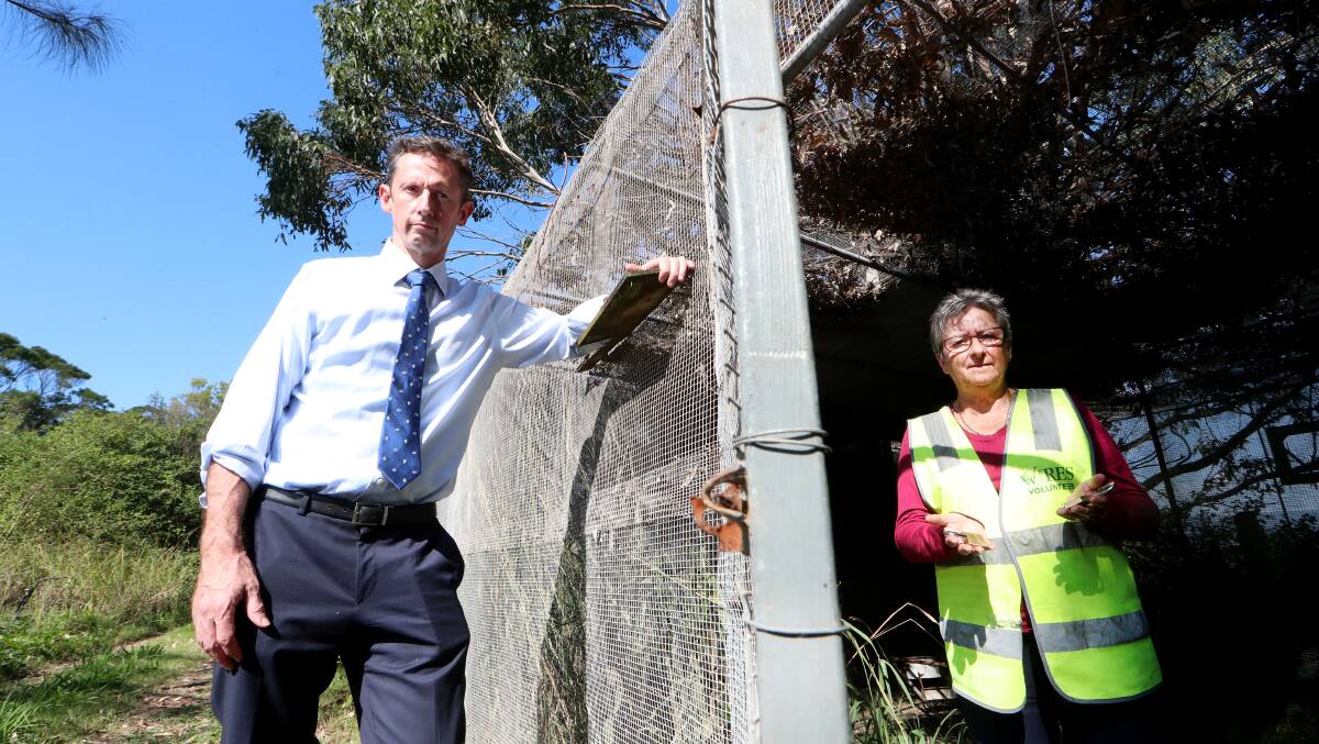 Vandalism: MP Stephen Jones and Heather Milroy-Bird assesing the damage of the bird aviary. Picture Sylvia Liber