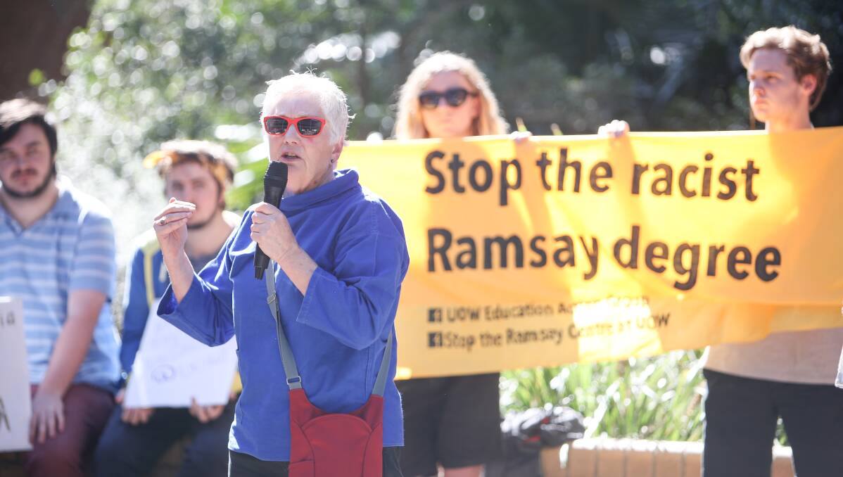 WHITE FLAG: Georgine Clarse speaking to UOW students and staff protesting ahead of a University Council meeting set to discuss the Ramsay Centre deal. Photo: Adam McLean